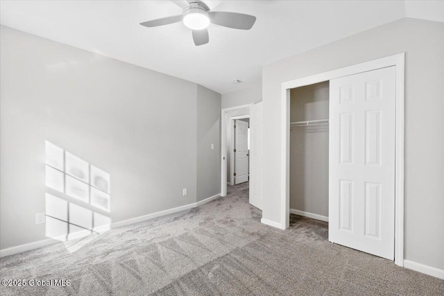 unfurnished bedroom with ceiling fan, carpet floors, and a closet