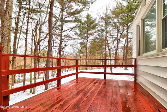 view of snow covered deck