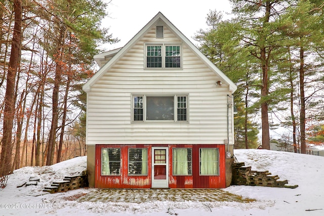 view of snow covered property