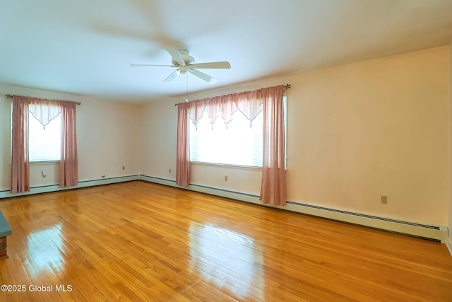 unfurnished room with ceiling fan, light hardwood / wood-style flooring, and a wealth of natural light