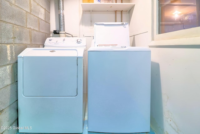 washroom with separate washer and dryer