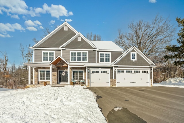 craftsman inspired home featuring a garage