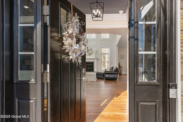 entryway with wood-type flooring