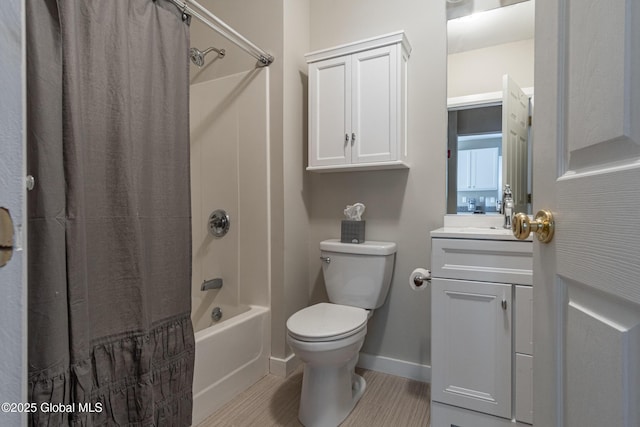 full bathroom with vanity, toilet, and shower / bath combo