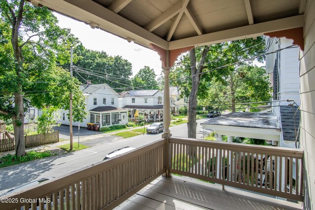 wooden deck featuring covered porch