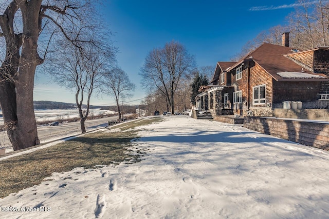 view of yard covered in snow