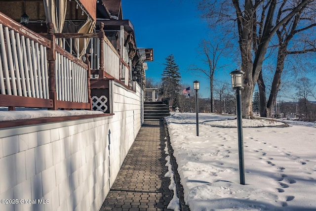 view of snow covered property