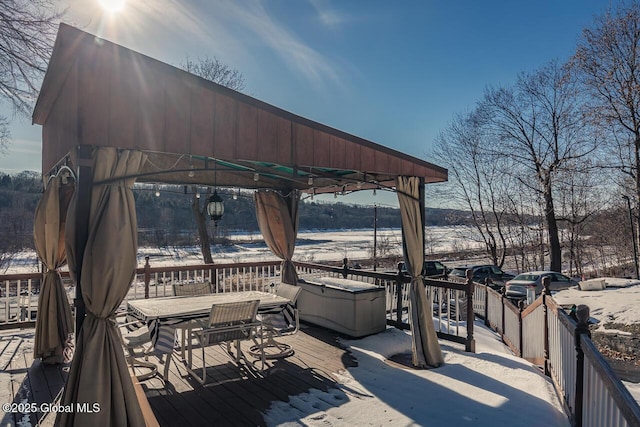 view of snow covered deck