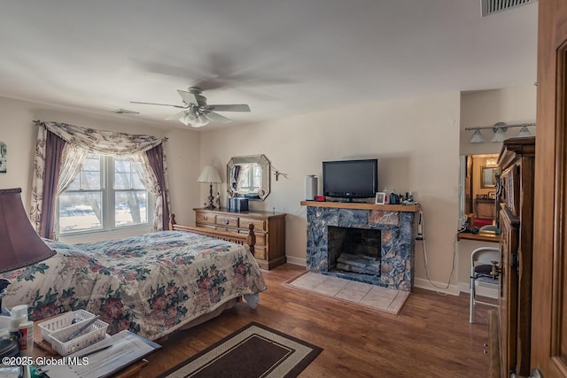 bedroom featuring ceiling fan and wood-type flooring