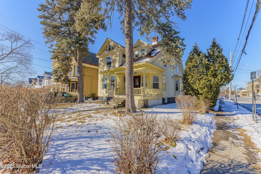 view of front of property featuring covered porch