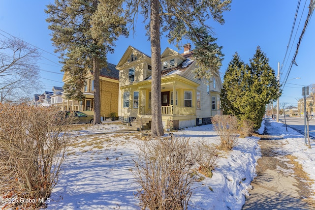 view of front of property featuring covered porch