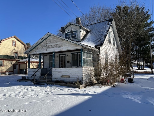 view of front of home featuring covered porch