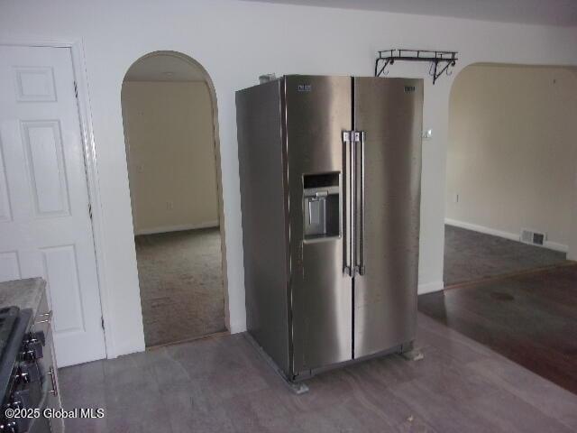 kitchen featuring high end refrigerator