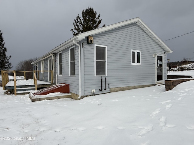 view of snow covered property