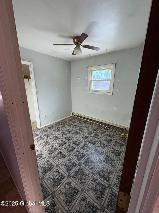 empty room with ceiling fan