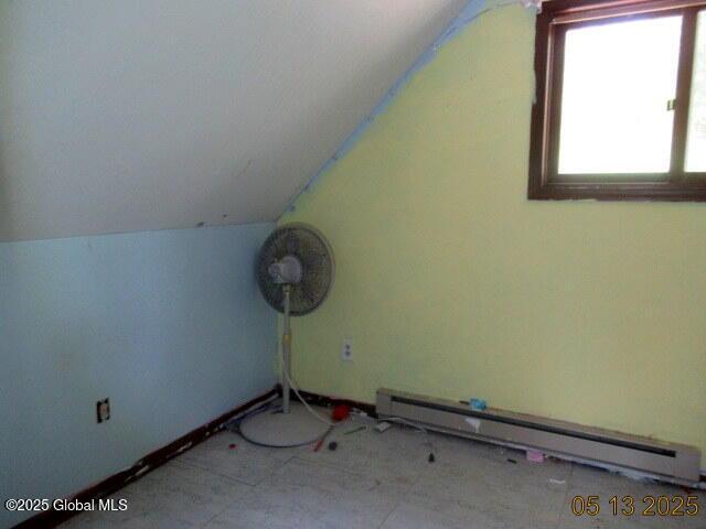 43 Bennett Rd, Queensbury, NY 12804 - additional living space featuring a baseboard heating unit and lofted ceiling