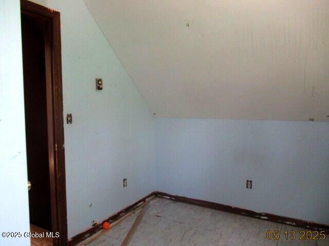 43 Bennett Rd, Queensbury, NY 12804 - additional living space featuring vaulted ceiling and light colored carpet