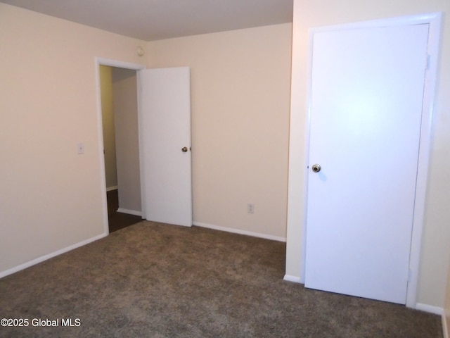 unfurnished bedroom with carpet