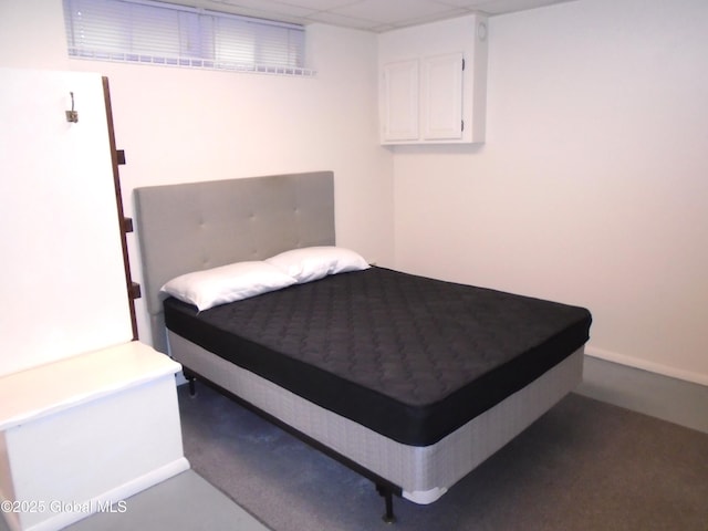 bedroom featuring a paneled ceiling