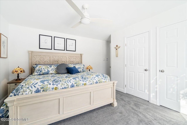 carpeted bedroom featuring ceiling fan