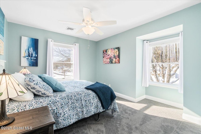 bedroom with light colored carpet and ceiling fan