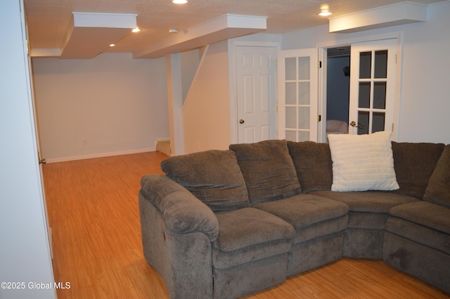 living room with light hardwood / wood-style flooring