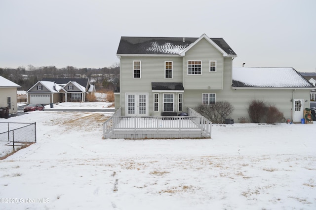 view of snow covered house