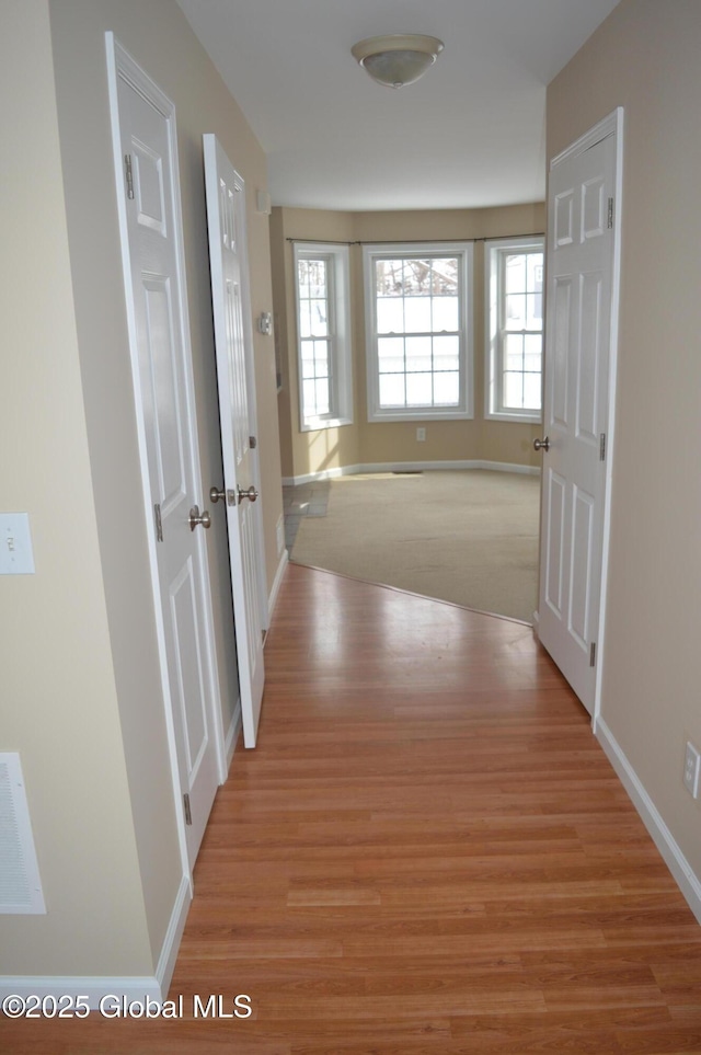 hallway featuring light wood-type flooring