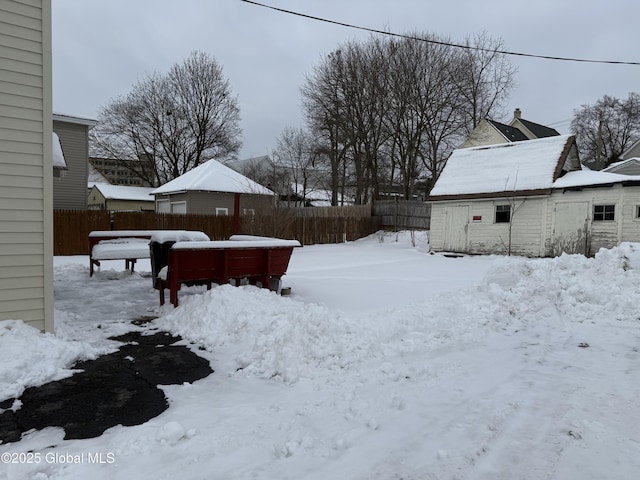 view of yard covered in snow