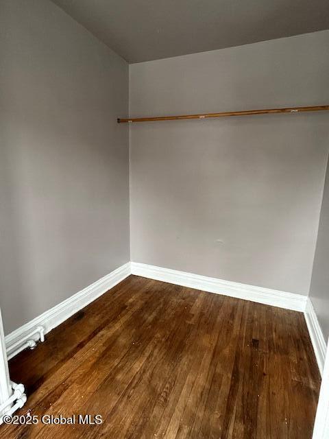 spare room featuring hardwood / wood-style flooring