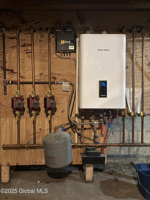 86 Reid St, Fort Plain, NY 13339 - utility room with tankless water heater