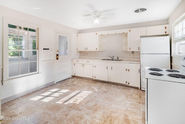 kitchen featuring white cabinetry, sink, white electric range, and ceiling fan