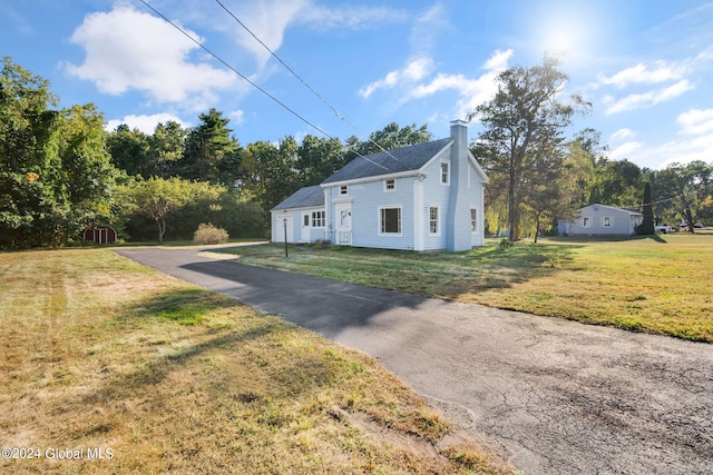 exterior space with a front yard