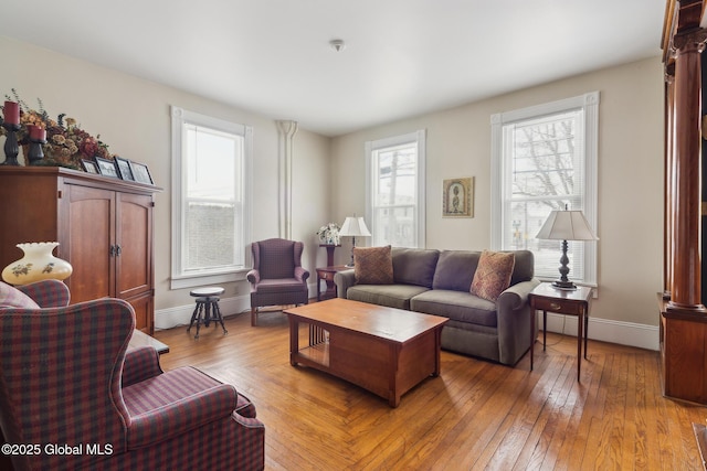 living room with light hardwood / wood-style flooring