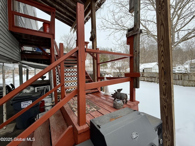 view of snow covered deck