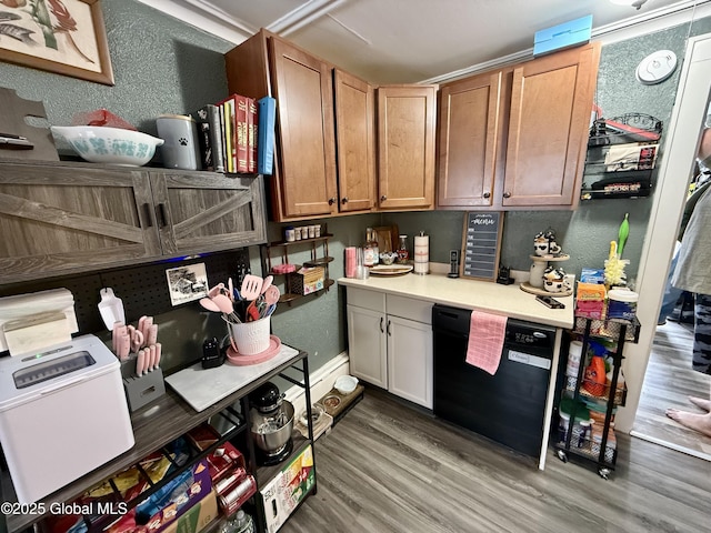 kitchen featuring wood-type flooring and dishwasher