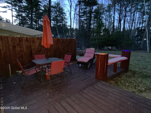 wooden deck with outdoor dining area
