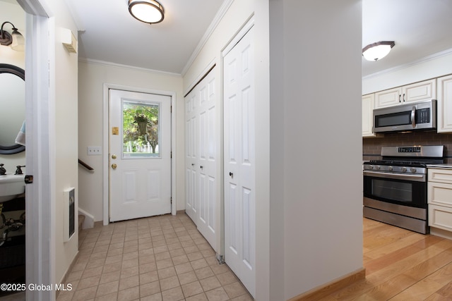 26 Queens Way, Queensbury, NY 12804 - doorway with ornamental molding and baseboards