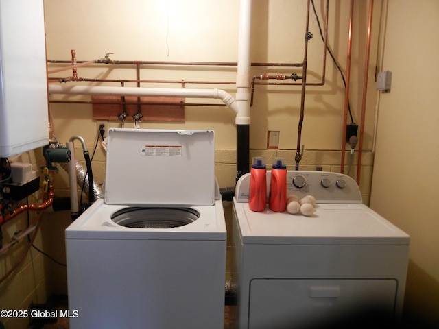 laundry room featuring independent washer and dryer