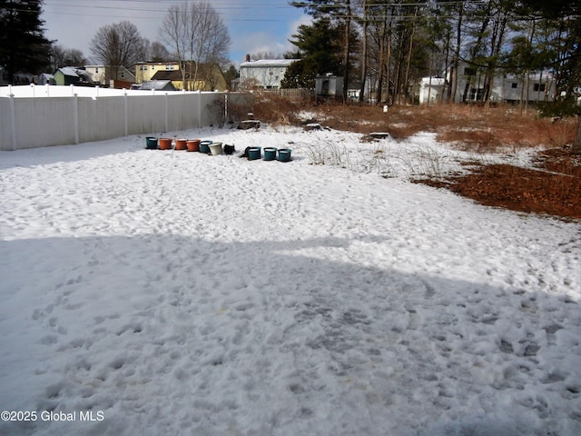 view of yard covered in snow