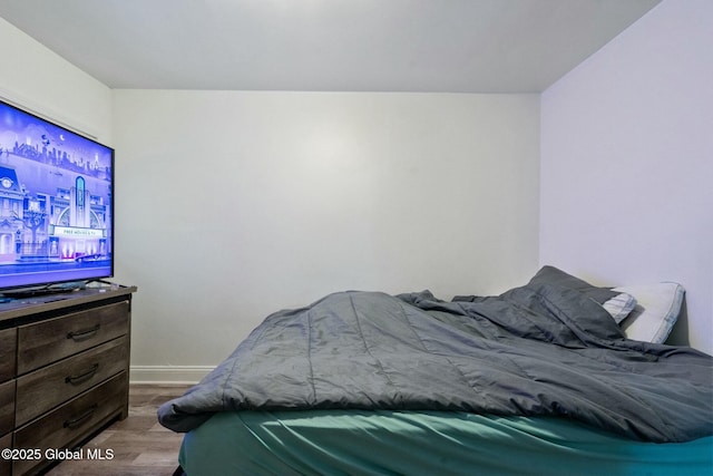 bedroom featuring hardwood / wood-style floors