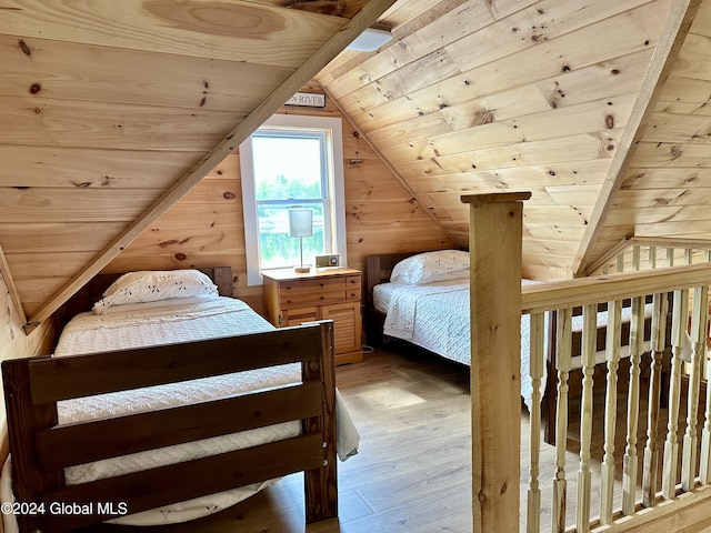 bedroom with vaulted ceiling, hardwood / wood-style floors, wood ceiling, and wood walls