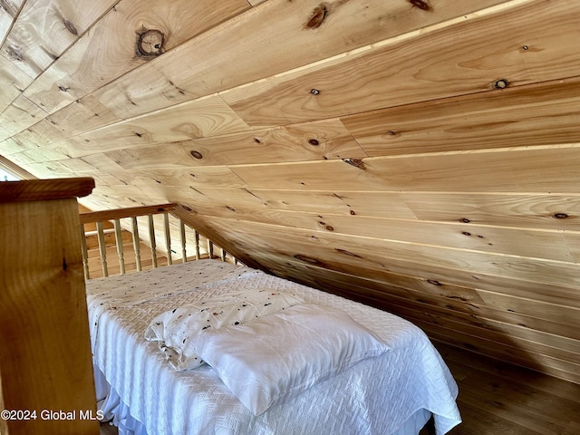 bedroom with wood walls