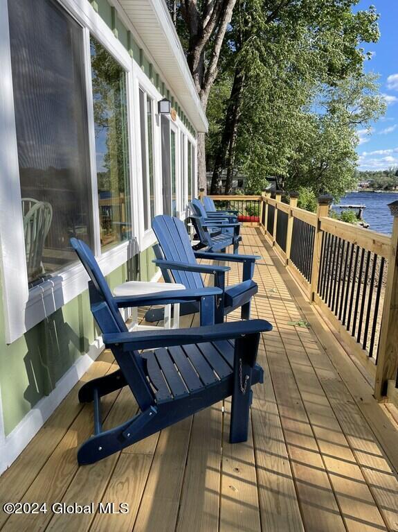 deck featuring a water view