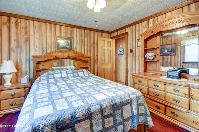 bedroom with wooden walls