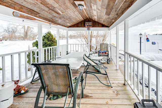 view of snow covered deck