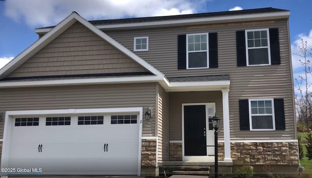 craftsman inspired home featuring a garage