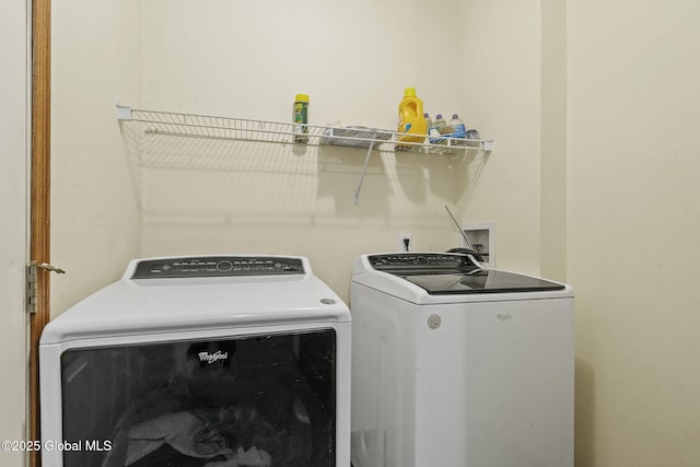 laundry area with washer and clothes dryer