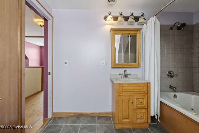 bathroom with vanity and shower / bath combo