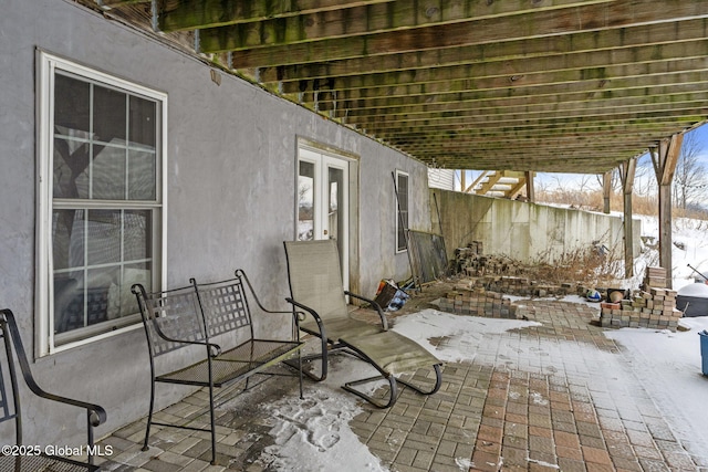 view of snow covered patio